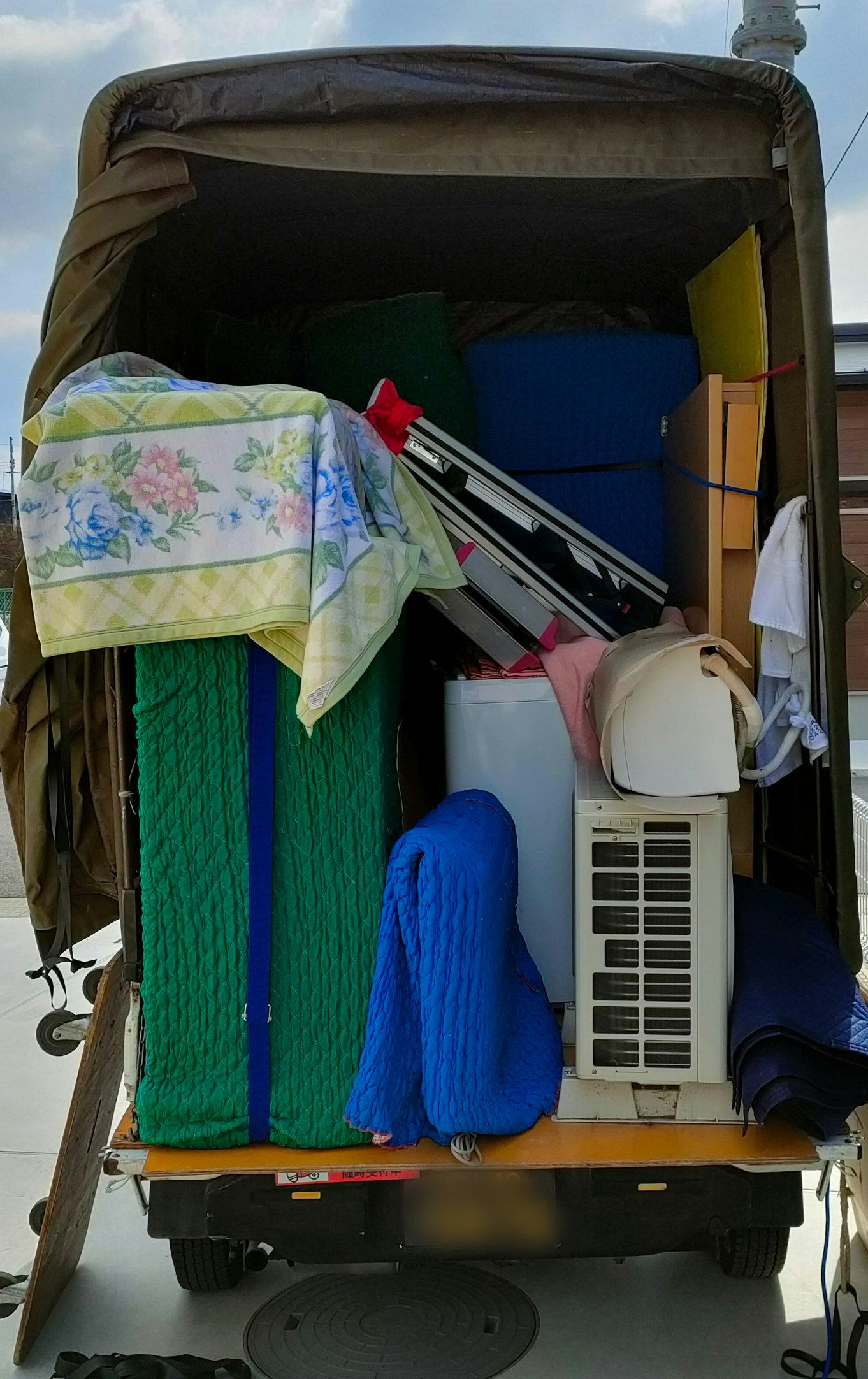 幌高車の中と佐々木博雄